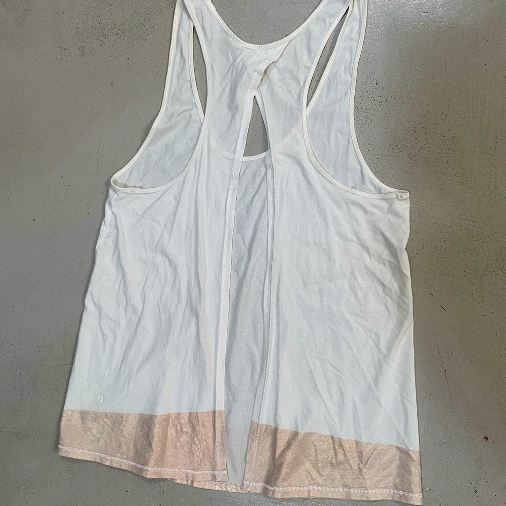 Lululemon tank with open back.